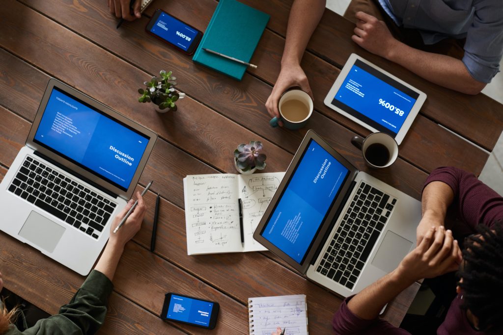 people sitting at meeting table